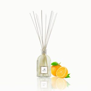 Difusor de Aroma Naranja con Palillos de Bambú, fragancia cítrica revitalizante, ideal para aromaterapia en oficinas y dormitorios.