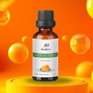 Mezcla de Aceite Esencial de Naranja Jazlyn Perfumería en frasco de 10 ml , sobre pedestal naranja con esferas cítricas y fondo vibrante, ideal para humidificador y aromaterapia energizante y alegre